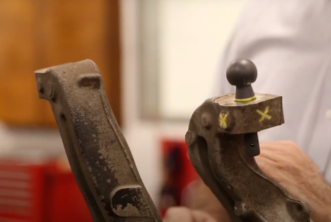 Ball joint in a damaged steering knuckle.