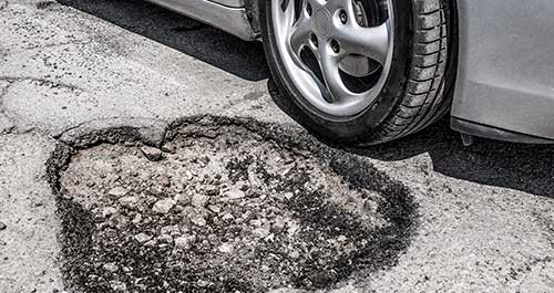 car-and-potholes-thumb