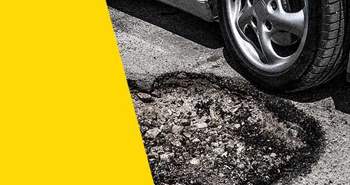 car-and-potholes-yellow-thumb