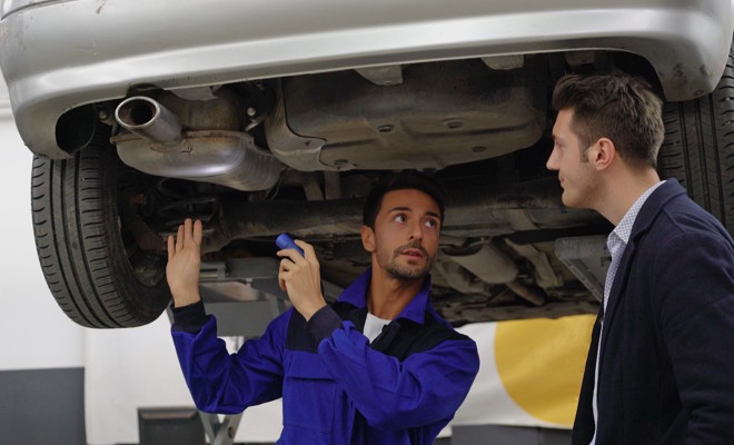 Mechanic-Talking-To-Customer Mechanic-Talking-To-Customer