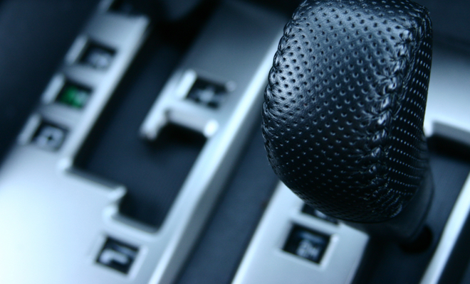 Close up of a leather coated gear shifter