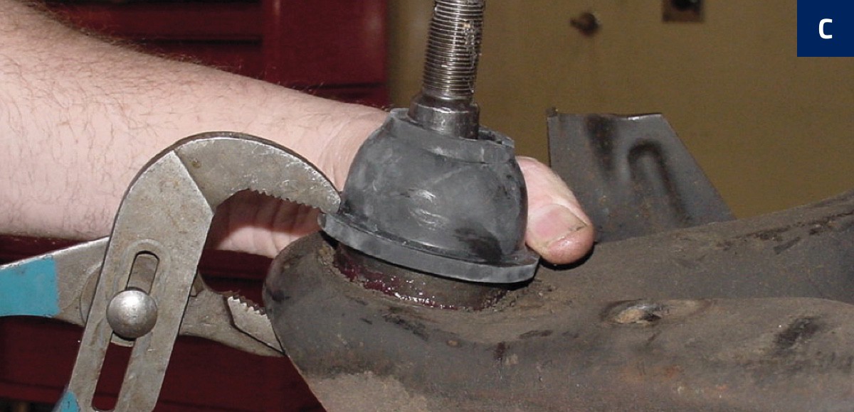 installing-press-fit-ball-joint-dust-boot-with-channel-lock-pliers